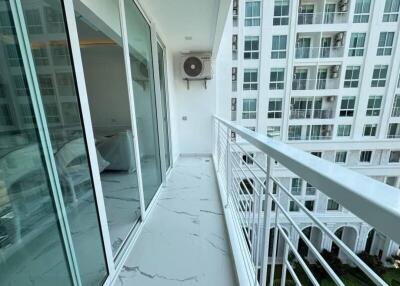 Balcony view with glass doors and air conditioning
