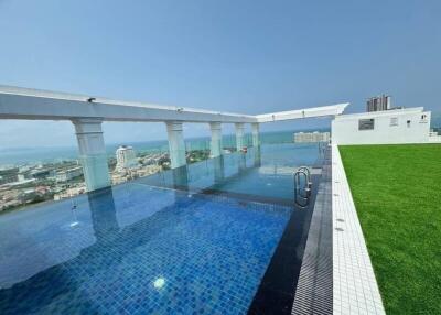 Infinity pool with ocean view and rooftop garden
