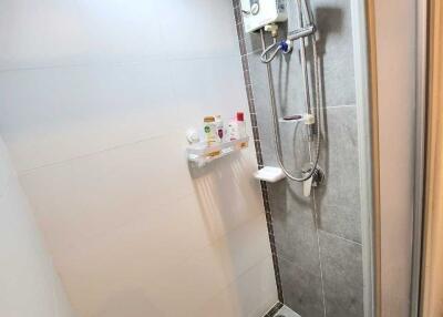 Modern bathroom with shower and water heater