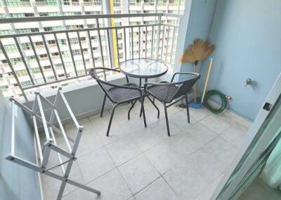 Cozy balcony with outdoor furniture and city view