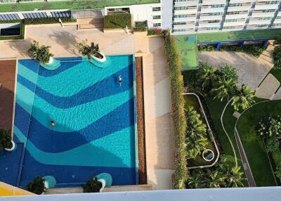 Aerial view of a shared swimming pool in a residential complex