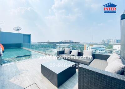 rooftop terrace with pool and seating area