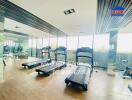 Modern gym with treadmills and large mirrors