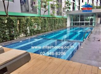 Modern apartment building with outdoor swimming pool