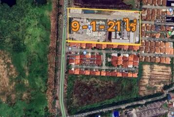 Aerial view of property area in a residential neighborhood with land plot dimensions