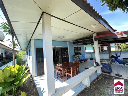 Outdoor area with white ceiling and tiled floor