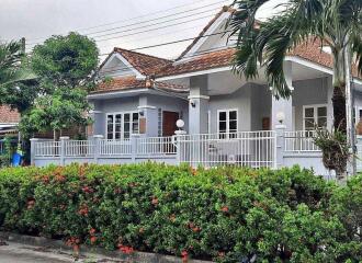 Single-story house with a front yard and garden