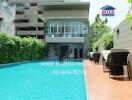 Outdoor swimming pool with adjacent seating area