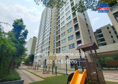 High-rise residential building with playground area