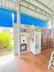 Outdoor kitchen with storage and refrigerator