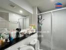 Modern bathroom with a shower and toiletries