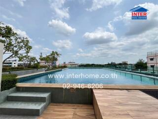 Swimming pool area with seating