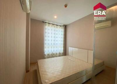 Modern bedroom with window and air conditioning