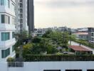 View of residential buildings and landscaped garden