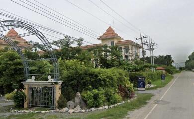 Exterior view of a residential building with greenery