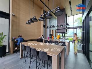 Modern communal kitchen with dining area