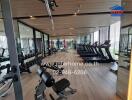 Spacious modern gym with equipment and large windows