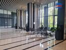 Modern lobby with seating area and large windows