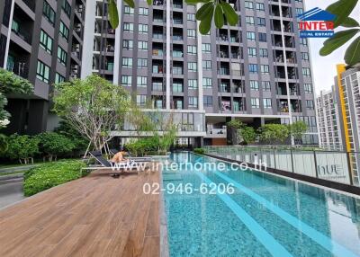 Modern apartment building with swimming pool