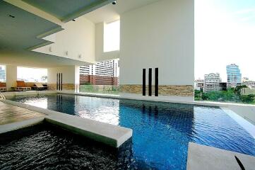 Indoor pool with city view