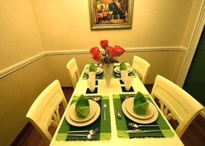 Dining room with a table set for four