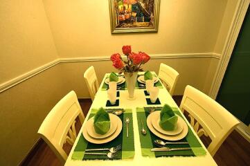 Dining room with a table set for four