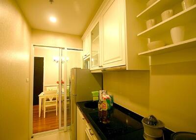 Modern kitchen with view into dining area