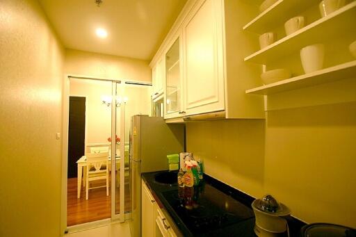 Modern kitchen with view into dining area