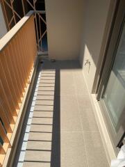 Balcony with railing and tiled floor