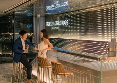 Elegant indoor bar area with seating