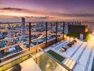 Rooftop terrace with city view at sunset