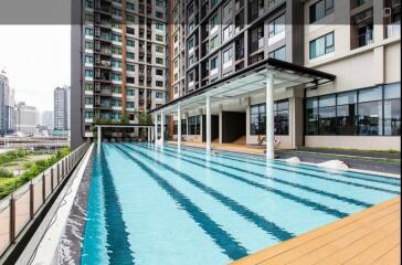 Outdoor swimming pool with modern building