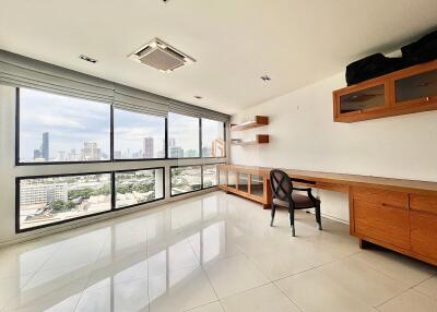 Spacious modern office with large windows and city view