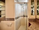 Modern bathroom with a shower enclosure and granite countertops