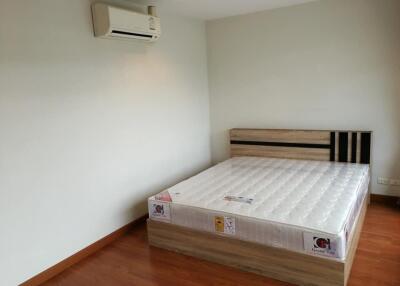 Minimalist bedroom with a new mattress