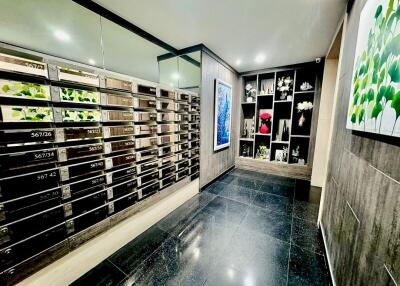 Modern lobby area with mailboxes and decorative elements