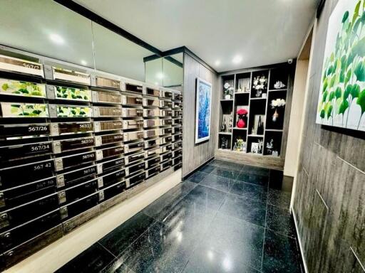 Modern lobby area with mailboxes and decorative elements