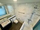 Modern bathroom with marble walls and shower