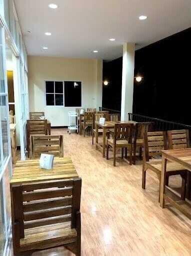 Indoor dining area with wooden furniture