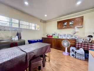 Spacious kitchen with dining area