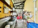 Outdoor kitchen with various kitchen appliances and storage