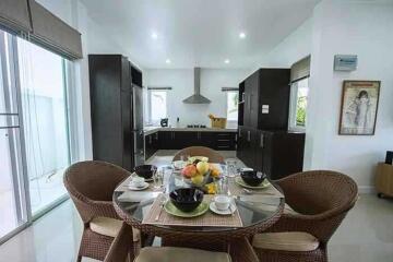 Modern kitchen with dining area