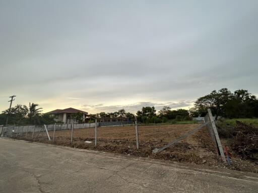 Vacant land for sale with nearby house