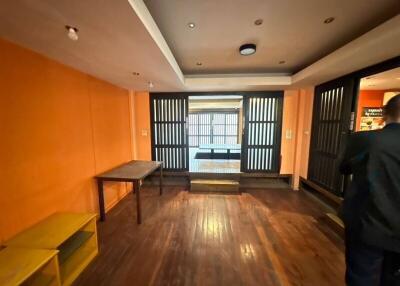 Living room with hardwood floors and sliding doors