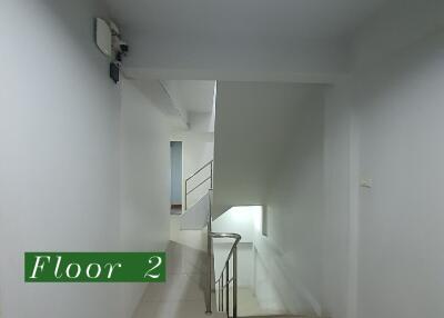 Second floor hallway with stairs