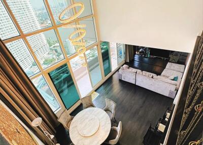 Modern high-rise living room with large windows