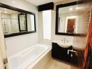 Modern bathroom with tub and sink