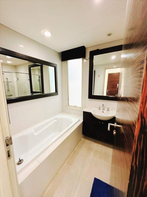 Modern bathroom with tub and sink