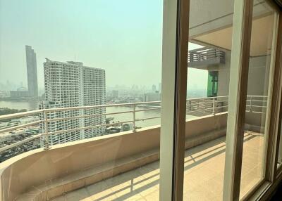 High-rise balcony with city skyline view