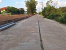 Long concrete road in rural area